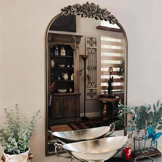 Miroir mural baroque en laiton doré